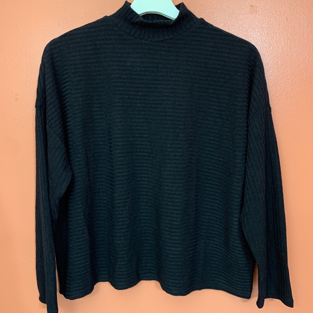 Black turtle neck sweater